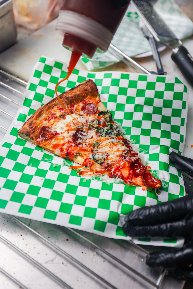 Dough Religion pizza being served